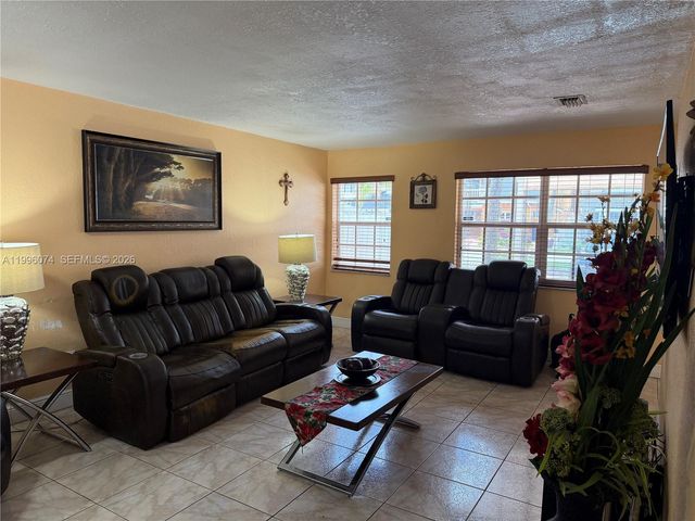 9085 Grand Canal Dr, Miami, FL 33174