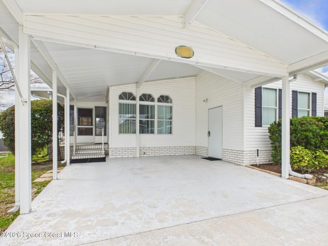 573 Dolphin Circle, Barefoot Bay, FL 32976