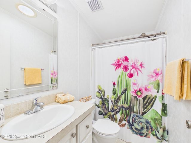 573 Dolphin Circle, Barefoot Bay, FL 32976