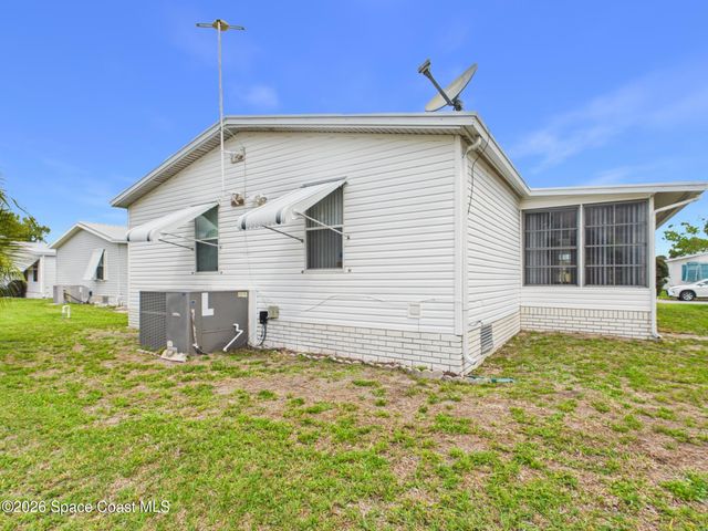 573 Dolphin Circle, Barefoot Bay, FL 32976