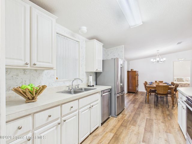 573 Dolphin Circle, Barefoot Bay, FL 32976