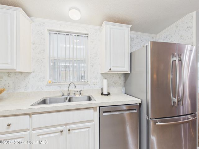 573 Dolphin Circle, Barefoot Bay, FL 32976