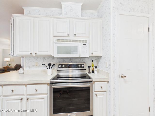 573 Dolphin Circle, Barefoot Bay, FL 32976