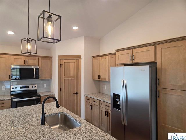 911 Three Lakes Court, Madison Lake, MN 56063