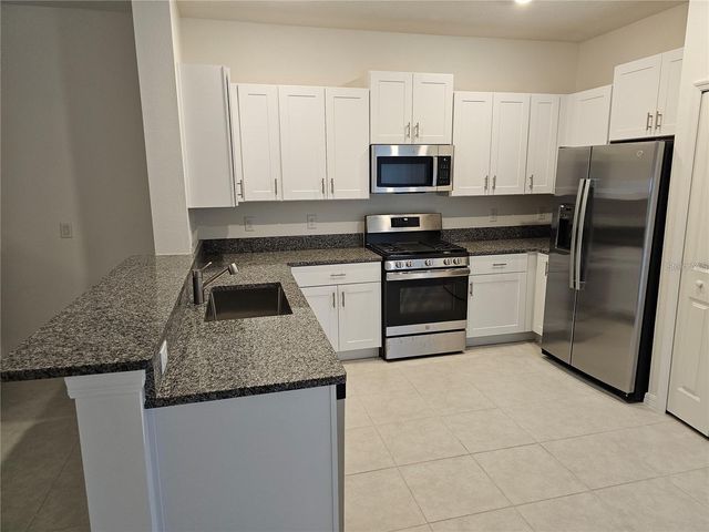 8309 CRESCENT OAKS DRIVE, New Port Richey, FL 34655