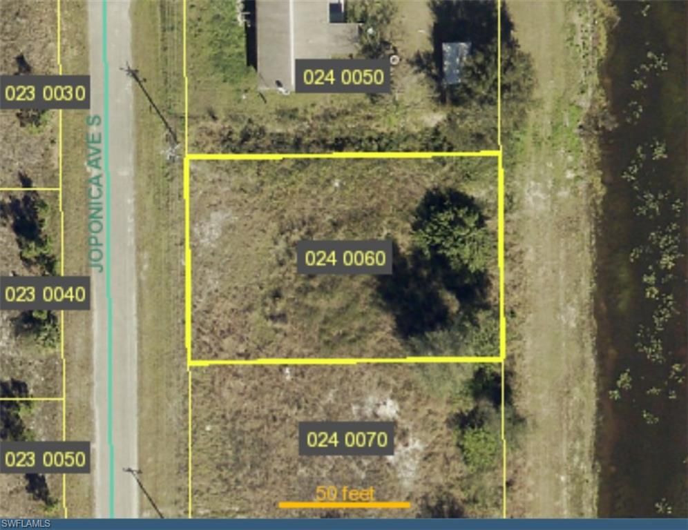 711 Joponica AVE S, LEHIGH ACRES, FL 33974 — exterior