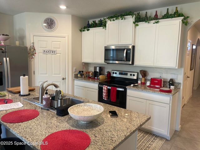 939 Remington Green Drive SE, Palm Bay, FL 32909