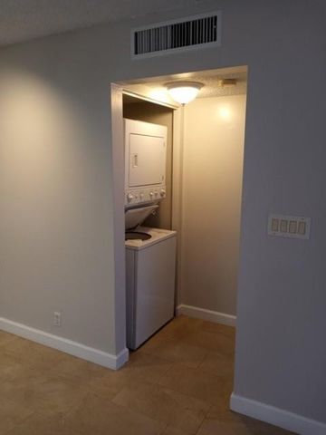 951 Lyons Road 6-107, Coconut Creek, FL 33063