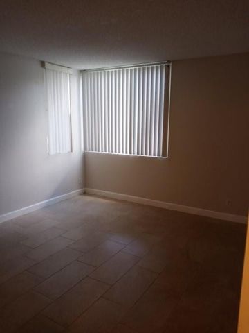 951 Lyons Road 6-107, Coconut Creek, FL 33063