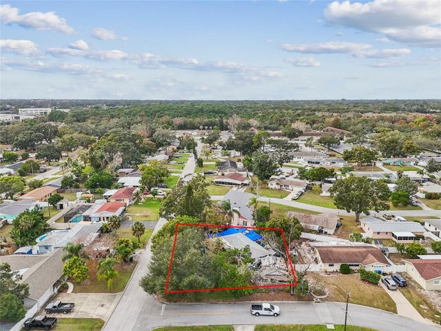 11071 VILLAGE GREEN AVENUE, Seminole, FL 33772