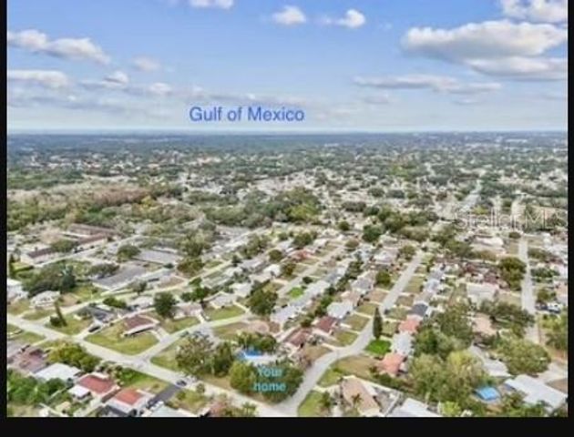 11071 VILLAGE GREEN AVENUE, Seminole, FL 33772