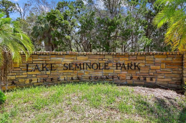 11071 VILLAGE GREEN AVENUE, Seminole, FL 33772