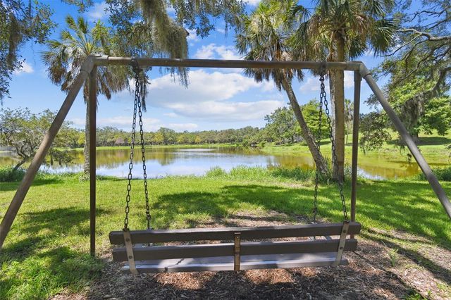 11071 VILLAGE GREEN AVENUE, Seminole, FL 33772