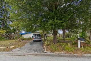 11071 VILLAGE GREEN AVENUE, Seminole, FL 33772