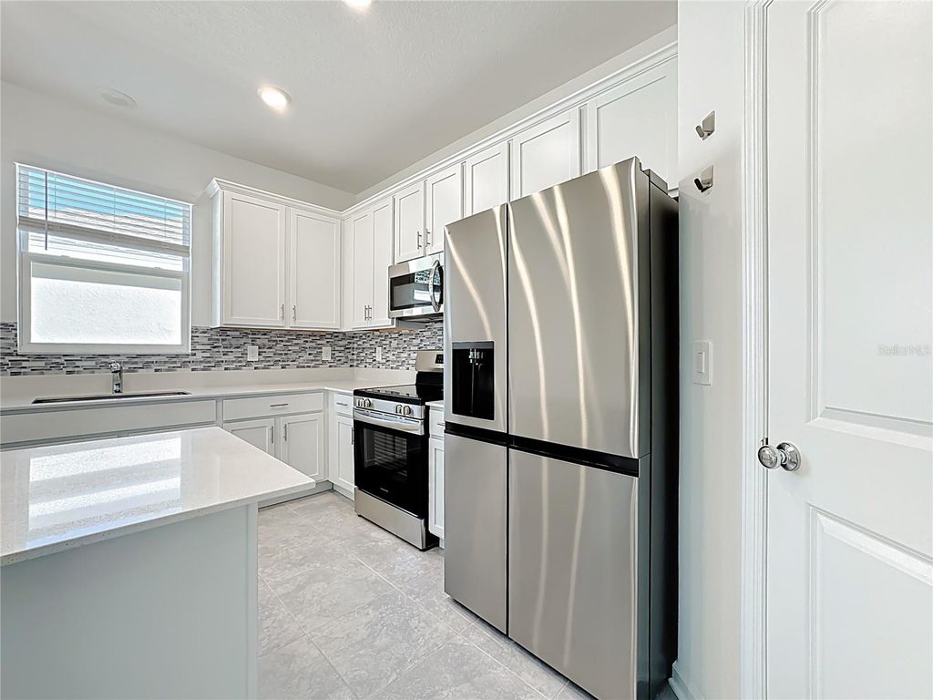 Image 8 of property listing at 4355 PEBBLES THROW DRIVE, Kissimmee, FL 34746