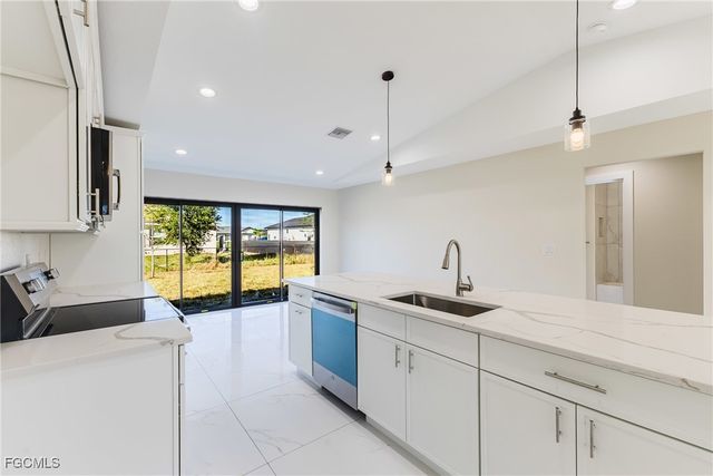 310 NW 16th PL, Cape Coral, FL 33993