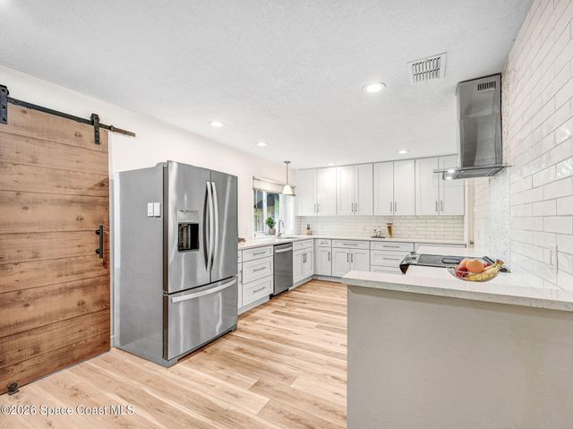 1343 Cherry Hills Road NE, Palm Bay, FL 32905