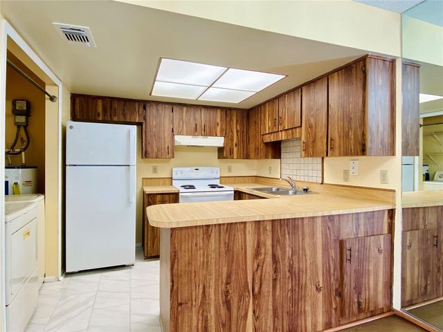 64 WINDTREE LANE 203, Winter Garden, FL 34787