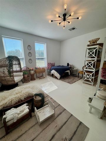 9100 Delesandri Drive, Hitchcock, TX 77563