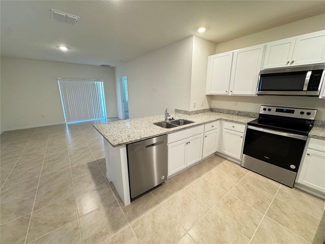 1180 CASCADES AVENUE, Davenport, FL 33837