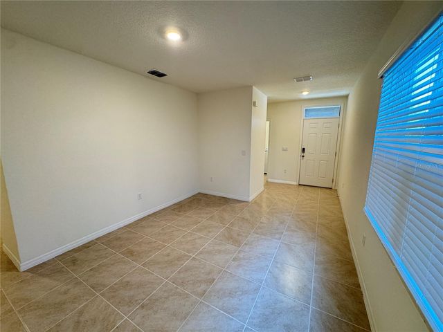 1180 CASCADES AVENUE, Davenport, FL 33837