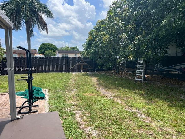 695 697 Curtiss Dr, Opa-locka, FL 33054
