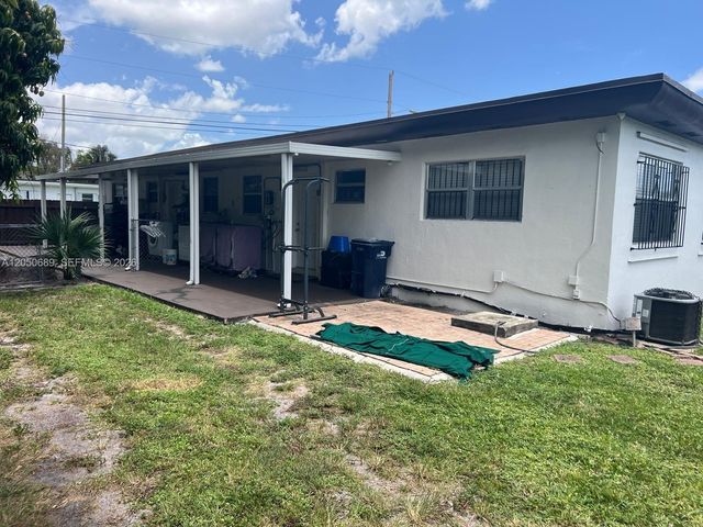 695 697 Curtiss Dr, Opa-locka, FL 33054