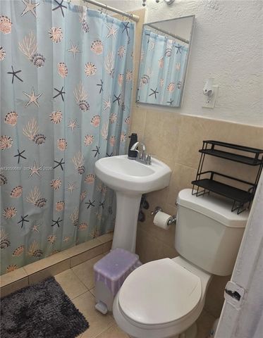 695 697 Curtiss Dr, Opa-locka, FL 33054