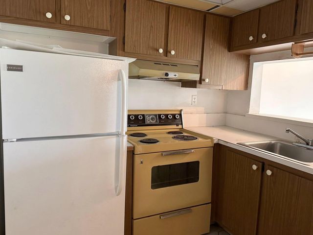 9090 Lime Bay Boulevard 106, Tamarac, FL 33321