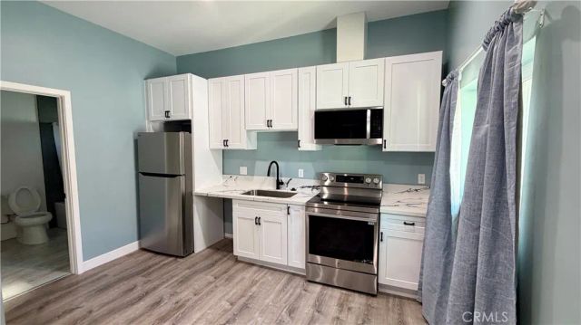 7845 Woodlake Avenue, West Hills, CA 91304
