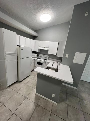 631 Lyons Rd 12201, Coconut Creek, FL 33063