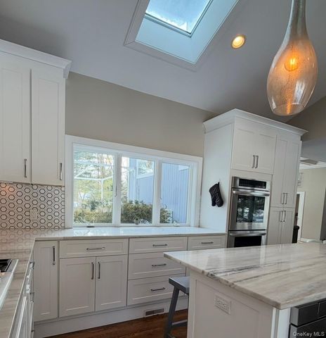 10 Skyes Neck Court, East Quogue, NY 11942