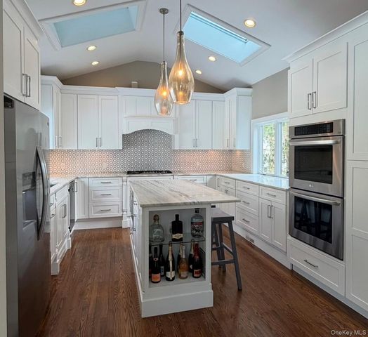 10 Skyes Neck Court, East Quogue, NY 11942