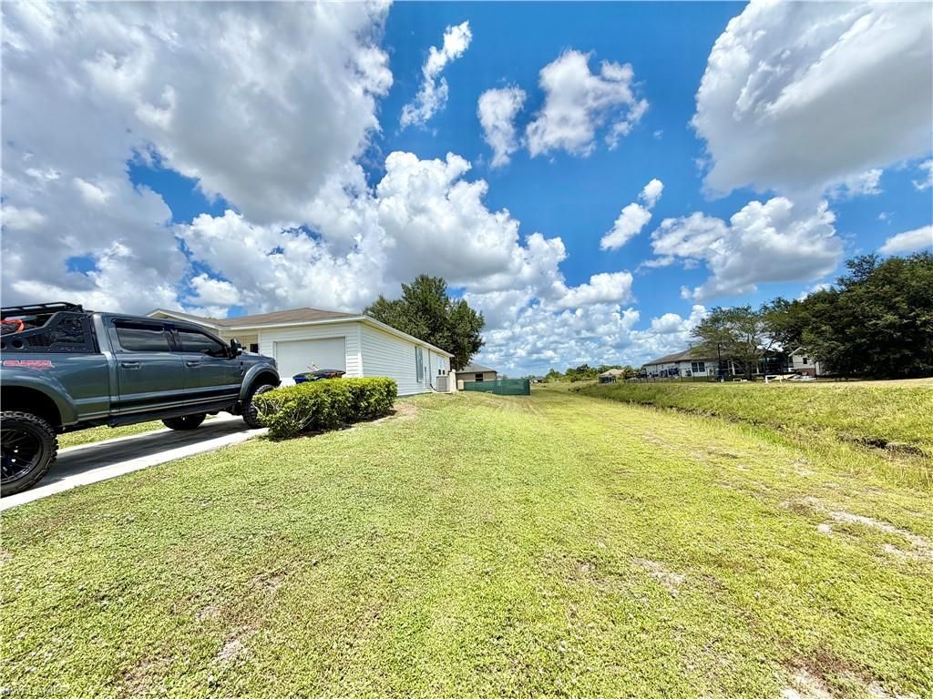2800 26th ST SW, LEHIGH ACRES, FL 33976 — photo 2