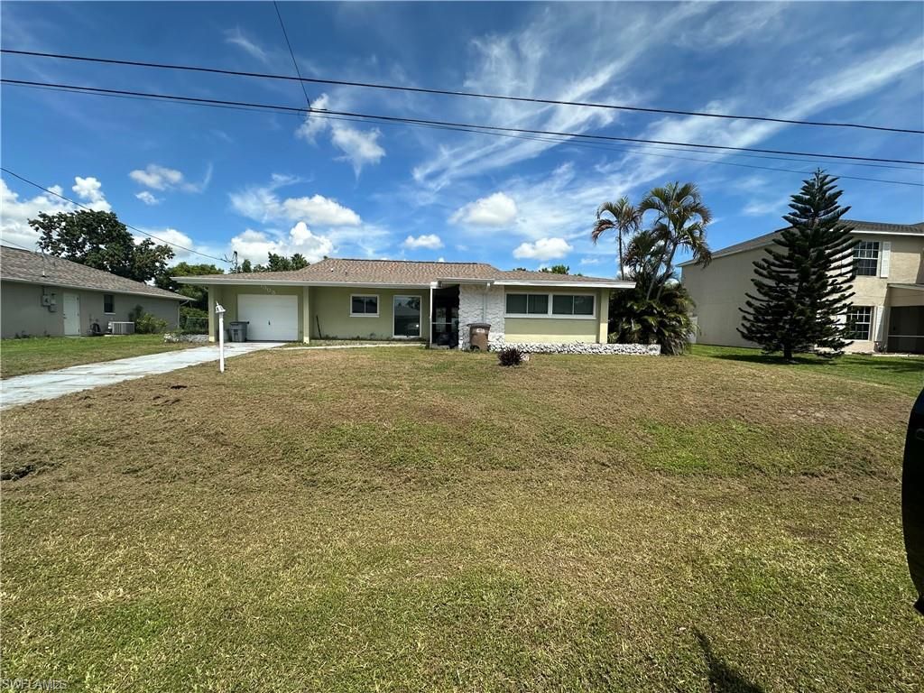 1303 18th ST, CAPE CORAL, FL 33990 — exterior
