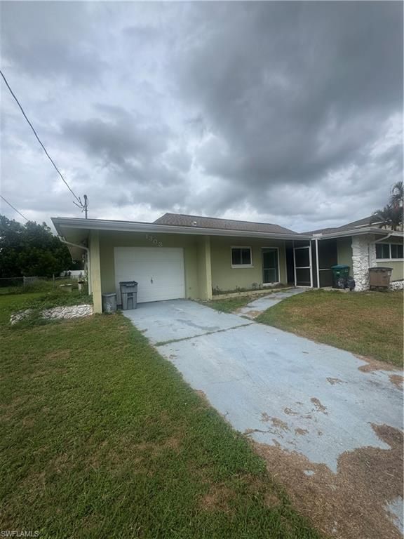 1303 18th ST, CAPE CORAL, FL 33990 — photo 4