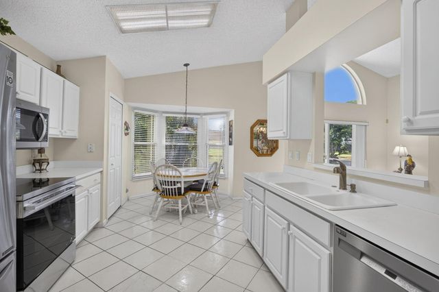 2221 SOUNDINGS Court, Greenacres, FL 33413