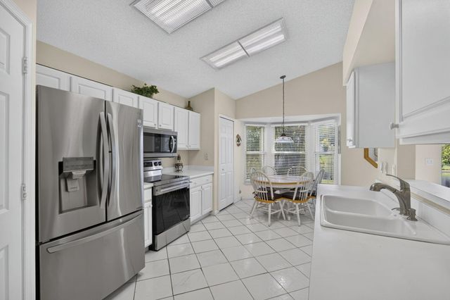 2221 SOUNDINGS Court, Greenacres, FL 33413