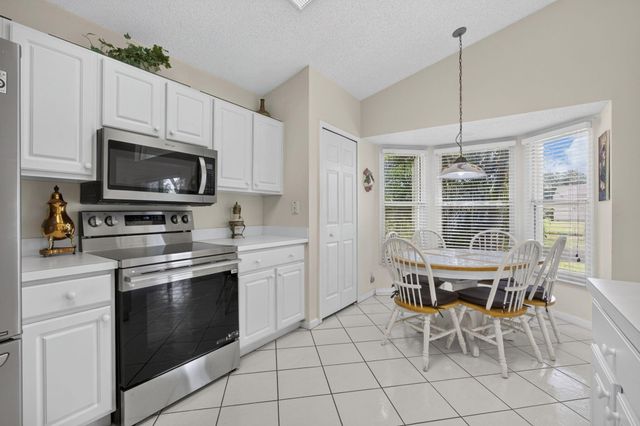 2221 SOUNDINGS Court, Greenacres, FL 33413