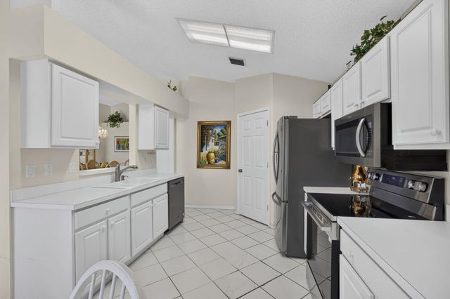 2221 SOUNDINGS Court, Greenacres, FL 33413
