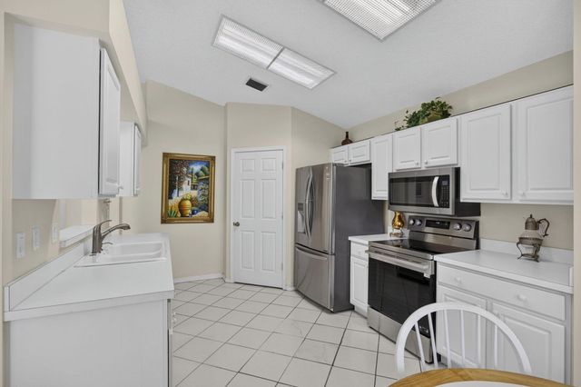 2221 SOUNDINGS Court, Greenacres, FL 33413