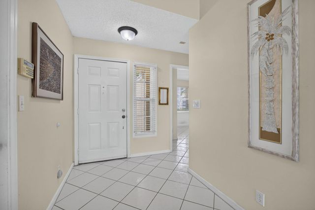 2221 SOUNDINGS Court, Greenacres, FL 33413
