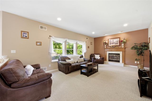 9 Ridgefield Drive, Shoreham, NY 11786
