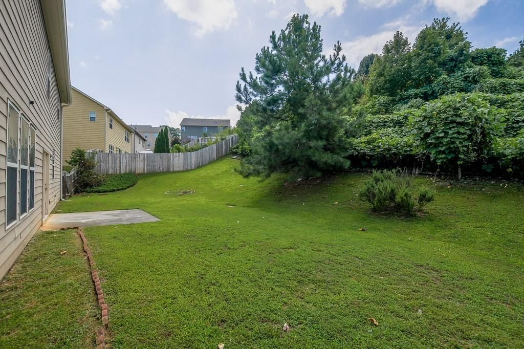 Image 42 of property listing at 1403 Sparkling Cove Drive, Buford, GA 30518