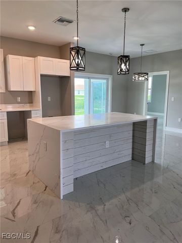 1011 Cedartree AVE, Lehigh Acres, FL 33971