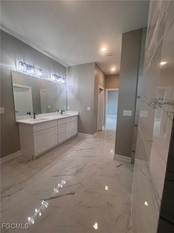 1011 Cedartree AVE, Lehigh Acres, FL 33971