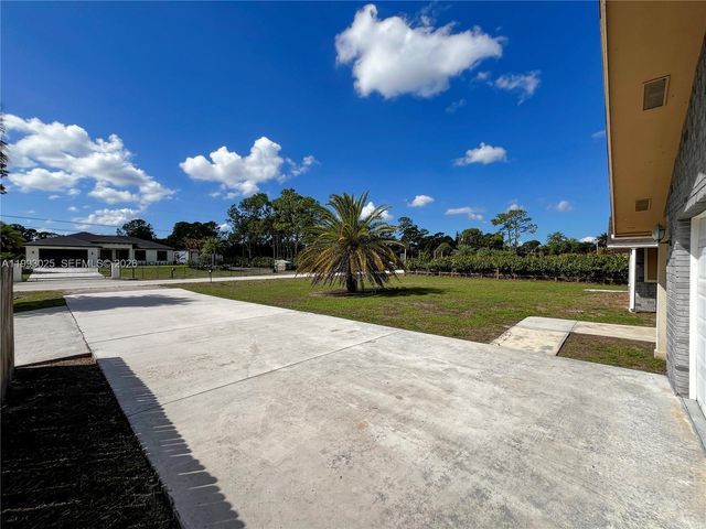 13587 N 77th Pl N, Unincorporated Palm Beach County, FL 33412