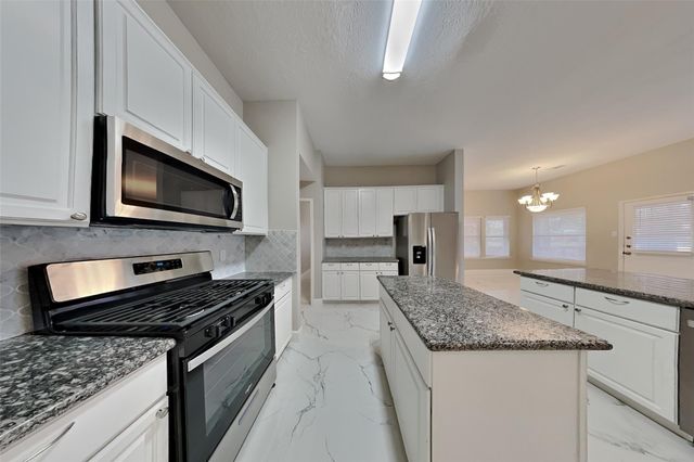 18327 Bluewater Cove Drive, Humble, TX 77346