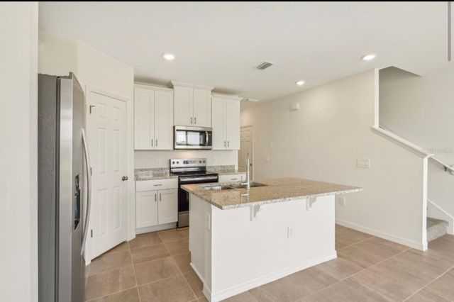 16390 BIRD OF PARADISE AVENUE, Clermont, FL 34714