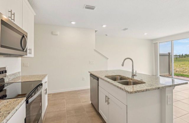 16390 BIRD OF PARADISE AVENUE, Clermont, FL 34714